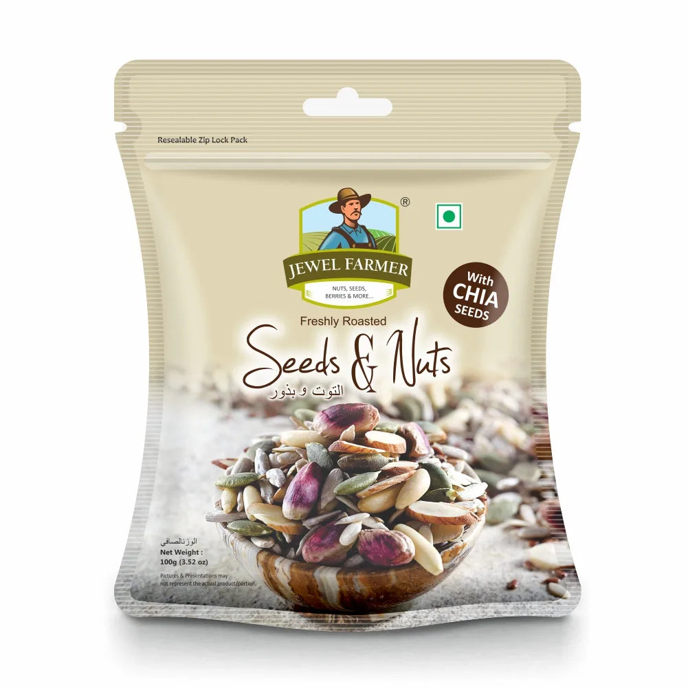 Jewel Farmer Seeds & Nuts 100g – A healthy mix of roasted pumpkin seeds, chia seeds, sunflower seeds, almonds, and cashews in convenient, high-protein snack packaging by TBJ Impex Pvt. Ltd.