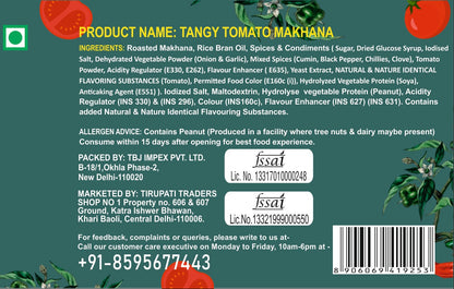 Snackman Roasted Makhana Tangy Tomato packaging with green background and red tomatoes.