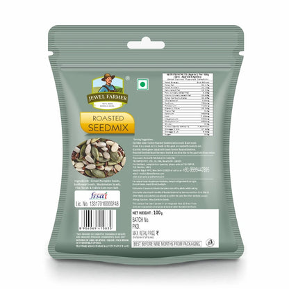 Back label of Jewel Farmer Roasted Seedmix 100g showing detailed ingredients, nutrition chart, shelf life, and seed blend composition.