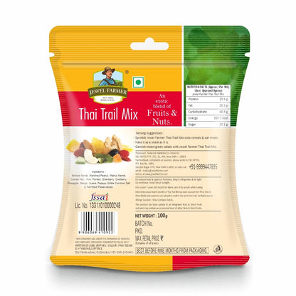 Back side of Jewel Farmer Thai Trail Mix 100g pack showing nutritional information, ingredients of premium dry fruits mix, and manufacturing details by top dry fruit brand in India.
