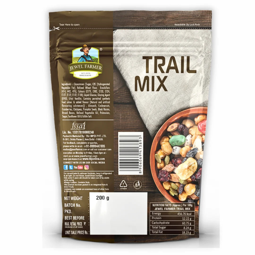 Back view of Jewel Farmer Trail Mix 200g showing detailed nutritional facts, ingredients of premium dry fruits blend, and packaging information by TBJ Impex Pvt. Ltd., trusted in healthy snacking products.