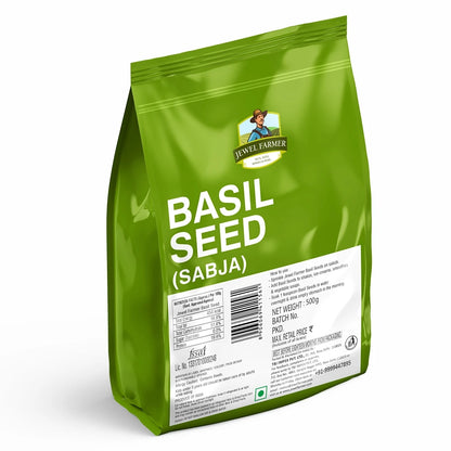 Back view of Jewel Farmer Basil Seed 500g pack showing detailed nutritional information, usage instructions, and ingredient list. This high-protein, fiber-rich superfood is made from whole natural basil seeds and is ideal for detox drinks, weight loss, and a healthy lifestyle. Manufactured by TBJ Impex Pvt. Ltd., a leading brand in natural and dry fruit products.
